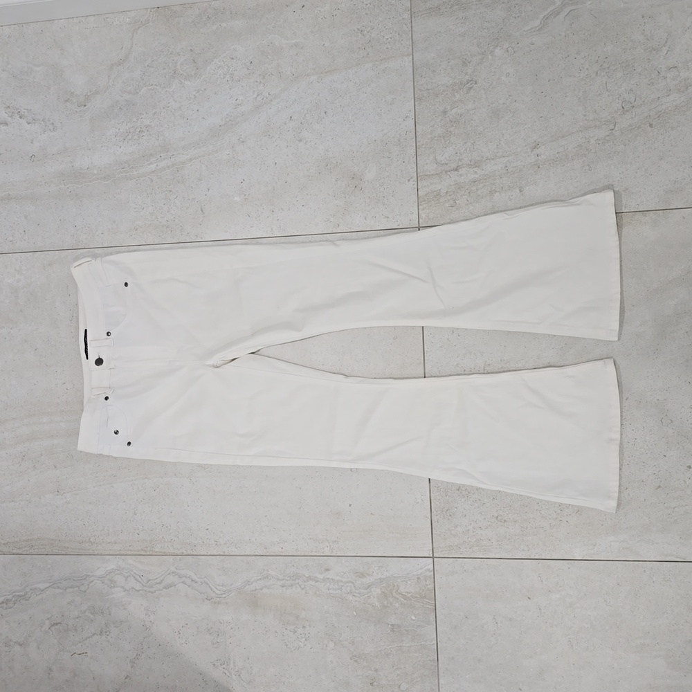 Off White Flared Jeans with Minor Discoloration